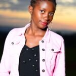 Portrait of a Woman in Pink Long Sleeve during Sunset